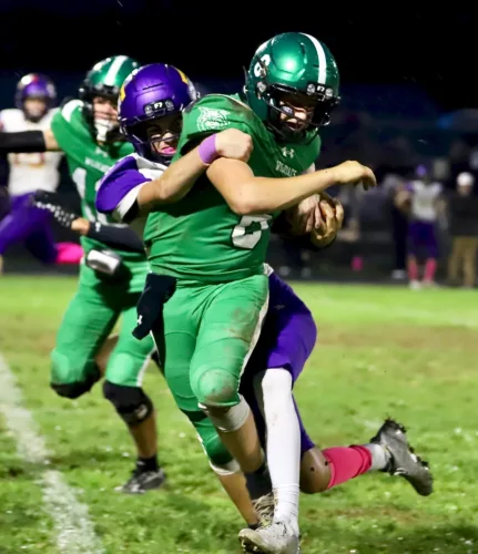 Prep football roundup: Rebels roll past Titans